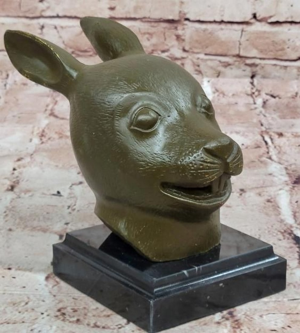 Spring Spirit: Happy Bronze Hare Head Sculpture: Spring Spirit: Happy Bronze Hare Head Sculpture Full of charm and vitality this bronze sculpture, by artist Yanez, of a happy hare head captures the joyful essence of this beloved creature. With aler