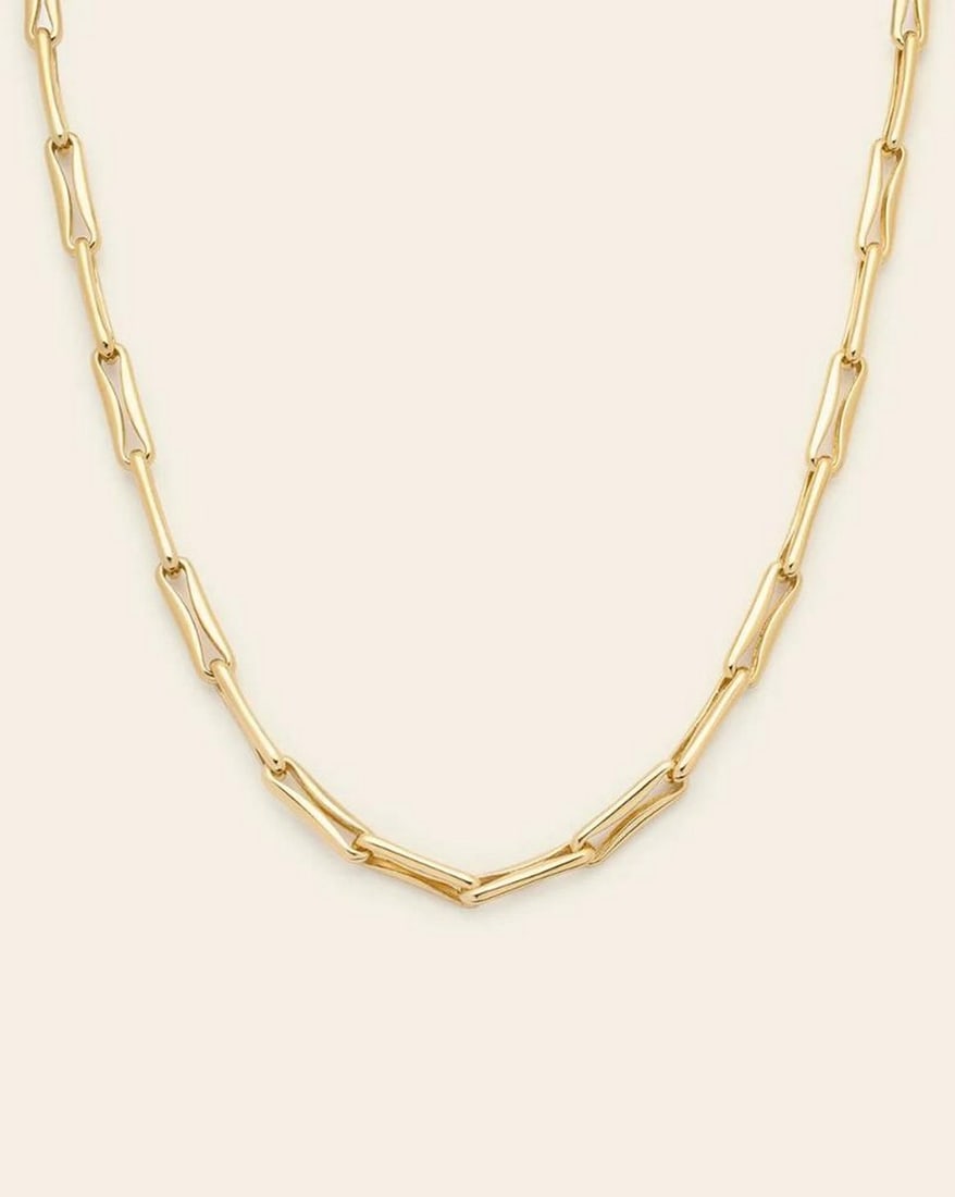 Balanced Forte Chain Necklace Gold: Balanced Forte Chain Necklace Gold A perfectly sized statement for everyday wear, this chain offers the ideal balance of boldness and versatility. Crafted in 14k gold plated over brass, the 20 mm x 5