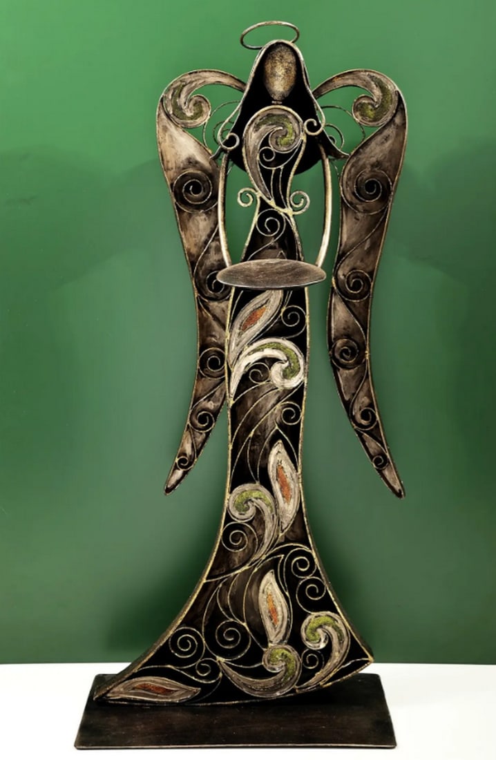 30" Handmade Angel Figurine Candle Stand: 30" Handmade Angel Figurine Candle Stand Candle stand made from iron featuring a handcrafted angel figurine. The piece includes a holder for a single candle and can be displayed on tables, mantels