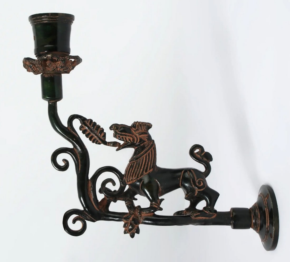 9" Brass Yali Design Candle Holder – Mythical Elegance & Traditional Craftsmanship: 9" Brass Yali Design Candle Holder – Mythical Elegance & Traditional Craftsmanship This Brass Yali Design Candle Holder Wall Decor is a striking fusion of artistry and utility. Featuring a v