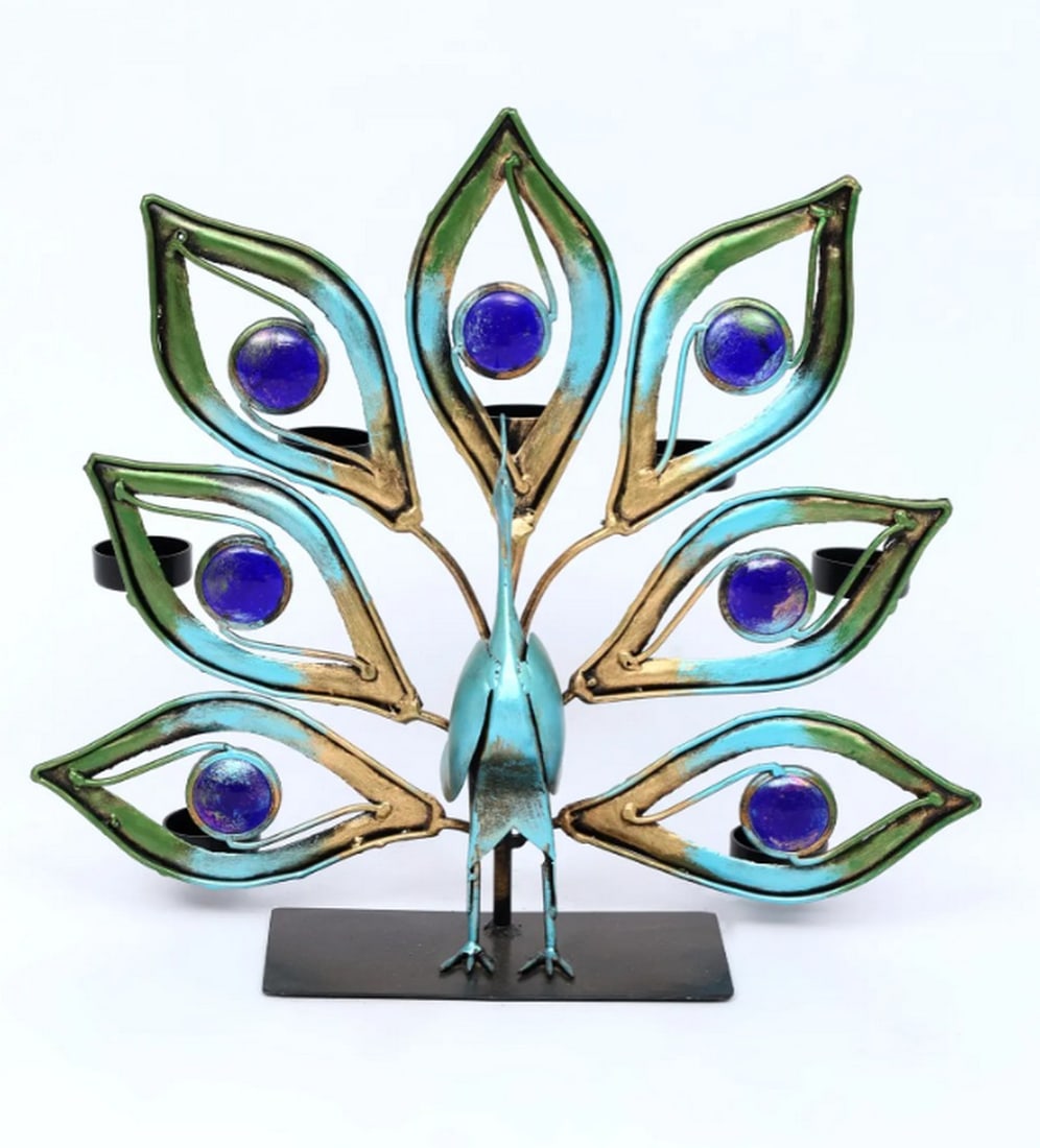 16" Decorative Peacock with Tealight Candle Holders: 16" Decorative Peacock with Tealight Candle Holders Handmade from iron, this decorative piece features a peacock form designed to hold tealight candles. The structure combines ornamental detailing