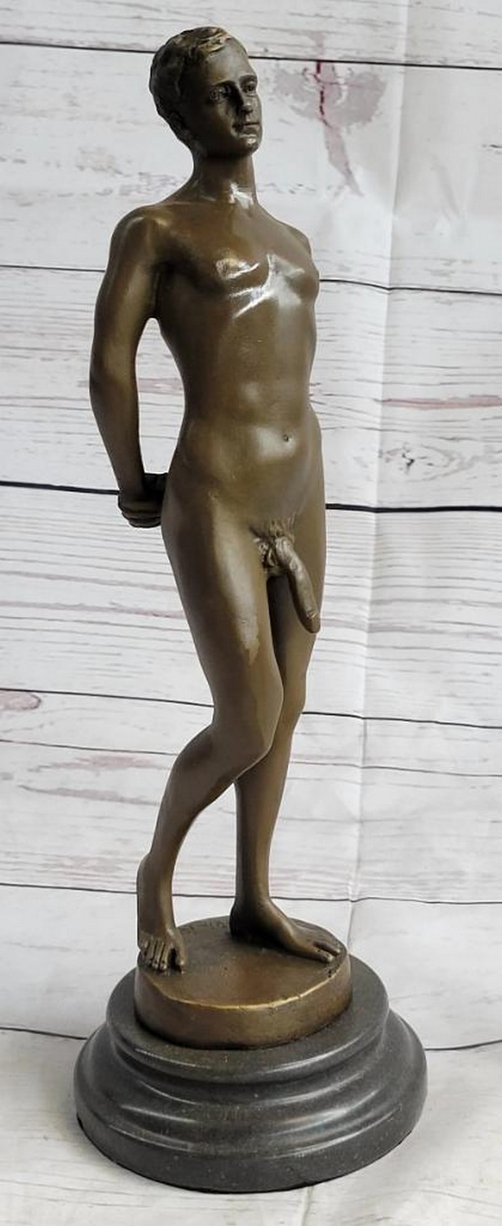 Well Endowed Nude Man Male Bronze Figure Sculpture by Nick - 12" x 5": Well Endowed Nude Man Male Bronze Figure Sculpture by Nick - 12" x 5" This striking bronze sculpture by artist Nick celebrates the confident beauty of the human form. The well-endowed,