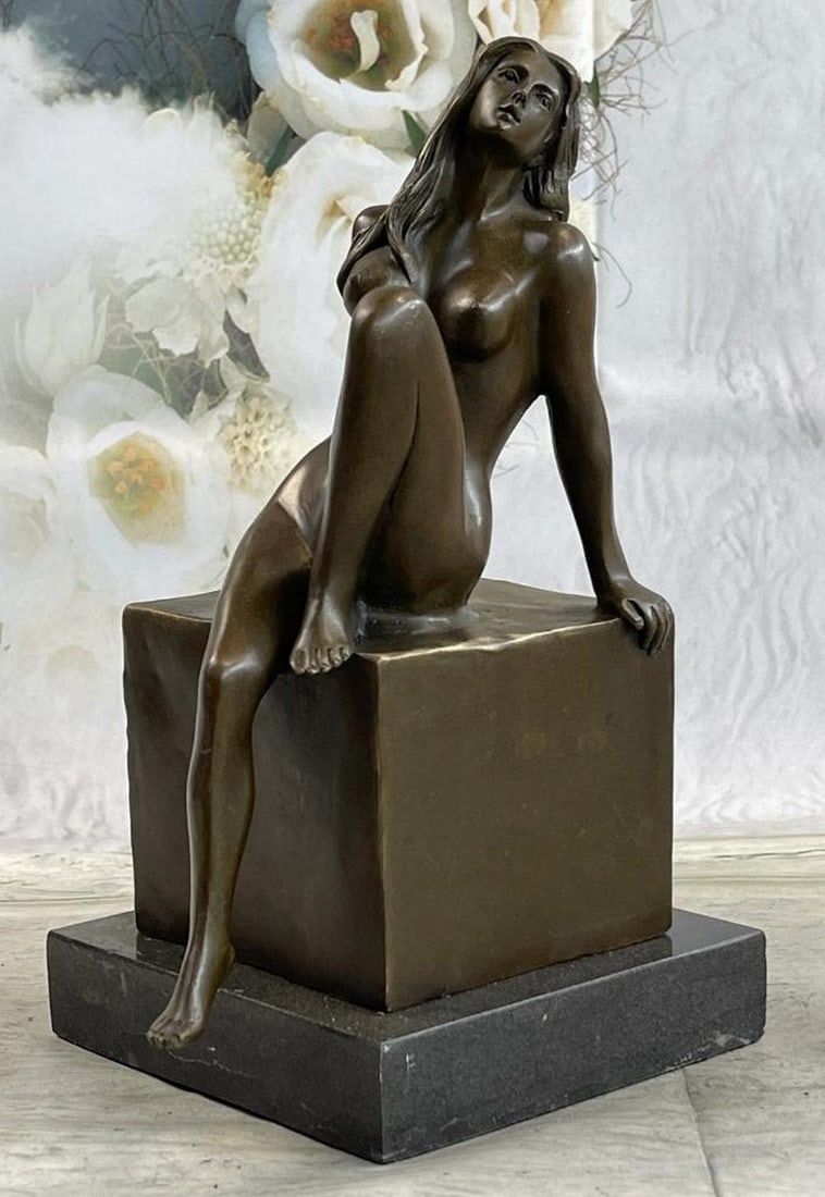 Girl Sitting with One Leg Up Original Bronze Statue - 11" x 5": Girl Sitting with One Leg Up Original Bronze Statue - 11" x 5" This bronze sculpture captures a serene moment by the beach, featuring a nude girl in a relaxed pose with eyes closed, enjoying
