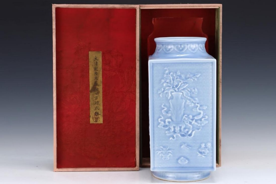 Old Collection Inspired By Qing Dynasty Qianlong Sky Blue-Glazed Square-Form Bottle: Old Collection Inspired By Qing Dynasty Qianlong Sky Blue-Glazed Square-Form Bottle This refined square-form bottle is inspired by the Qianlong period of the Qing Dynasty and is finished in a delicate