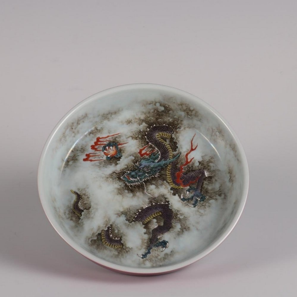 Qing Yongzheng Inspired Carmine Glaze Cloud Dragon Plate: Qing Yongzheng Inspired Carmine Glaze Cloud Dragon Plate Inspired by the imperial artistry of the Qing Dynasty Yongzheng period, this striking porcelain plate embodies power and celestial grandeur. Se