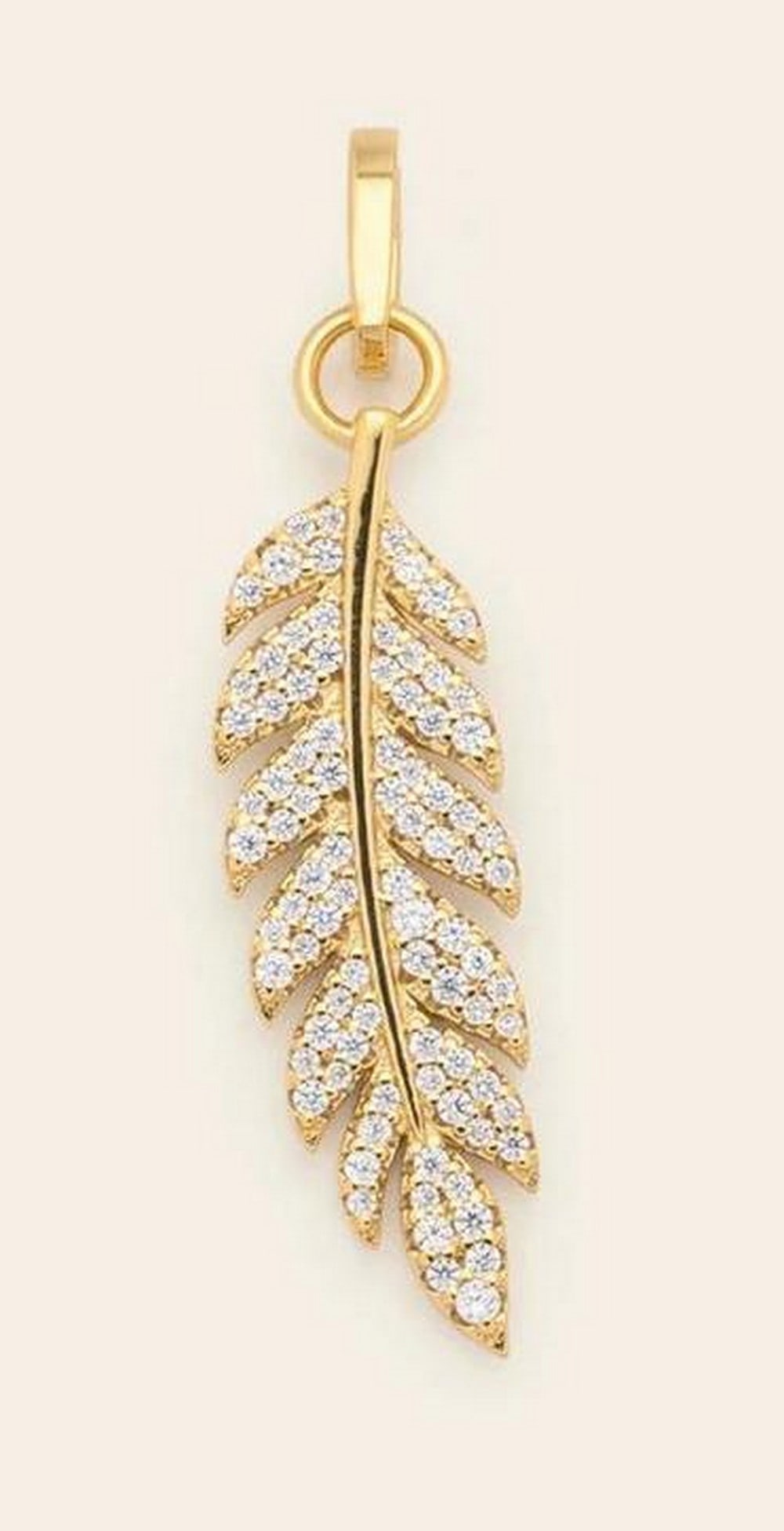 Golden Leaf Charm: Golden Leaf Charm A touch of nature with a lot of shine, the Golden Leaf Charm features a delicate leaf shape set with CZ stones for a sparkling, eye-catching effect. Crafted in 14k gold vermeil, this