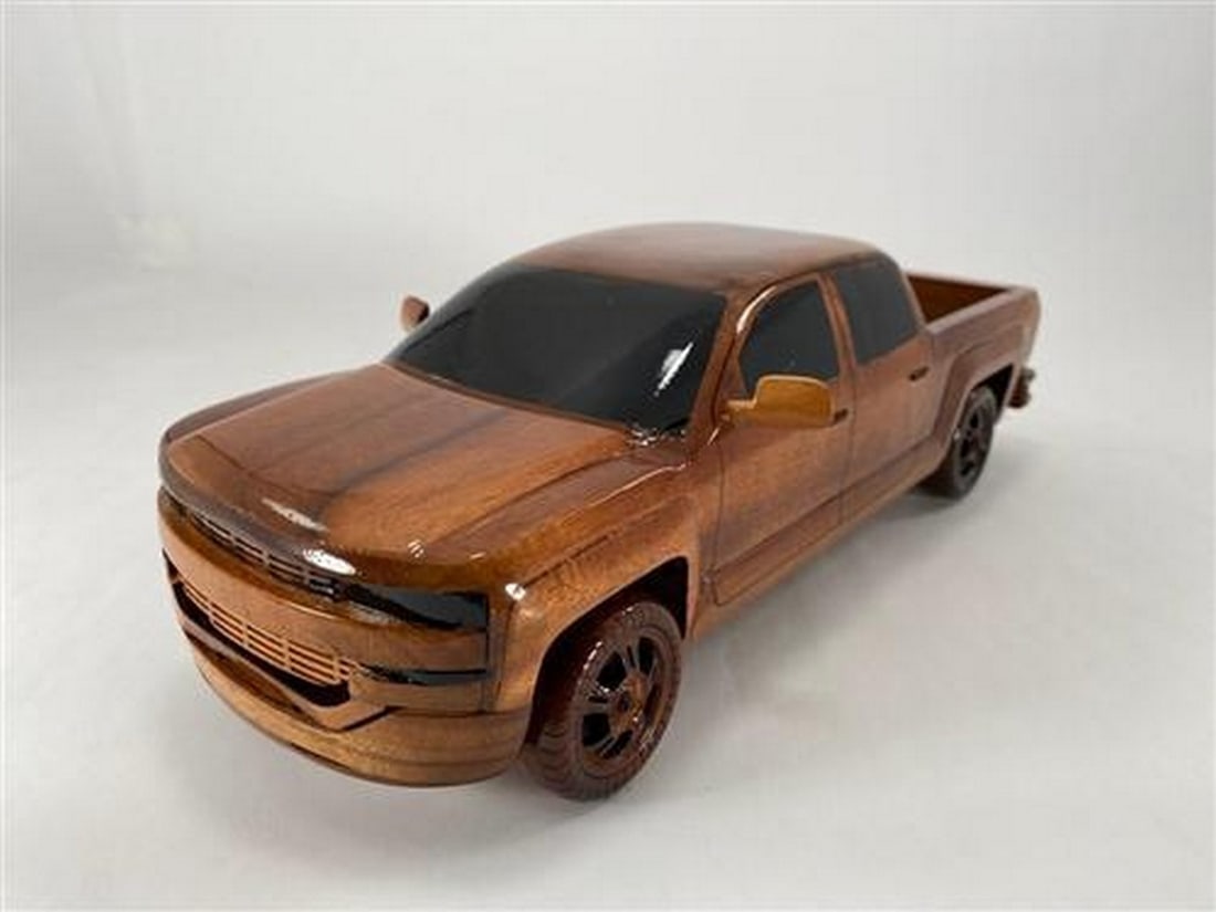 2018 Chevrolet Pickup: 2018 Chevrolet Pickup This scale replica of the Chevrolet Pickup is hand crafted from solid mahogany, making it a great gift or accent piece for the classic car lover. Hand carved details are enhanc