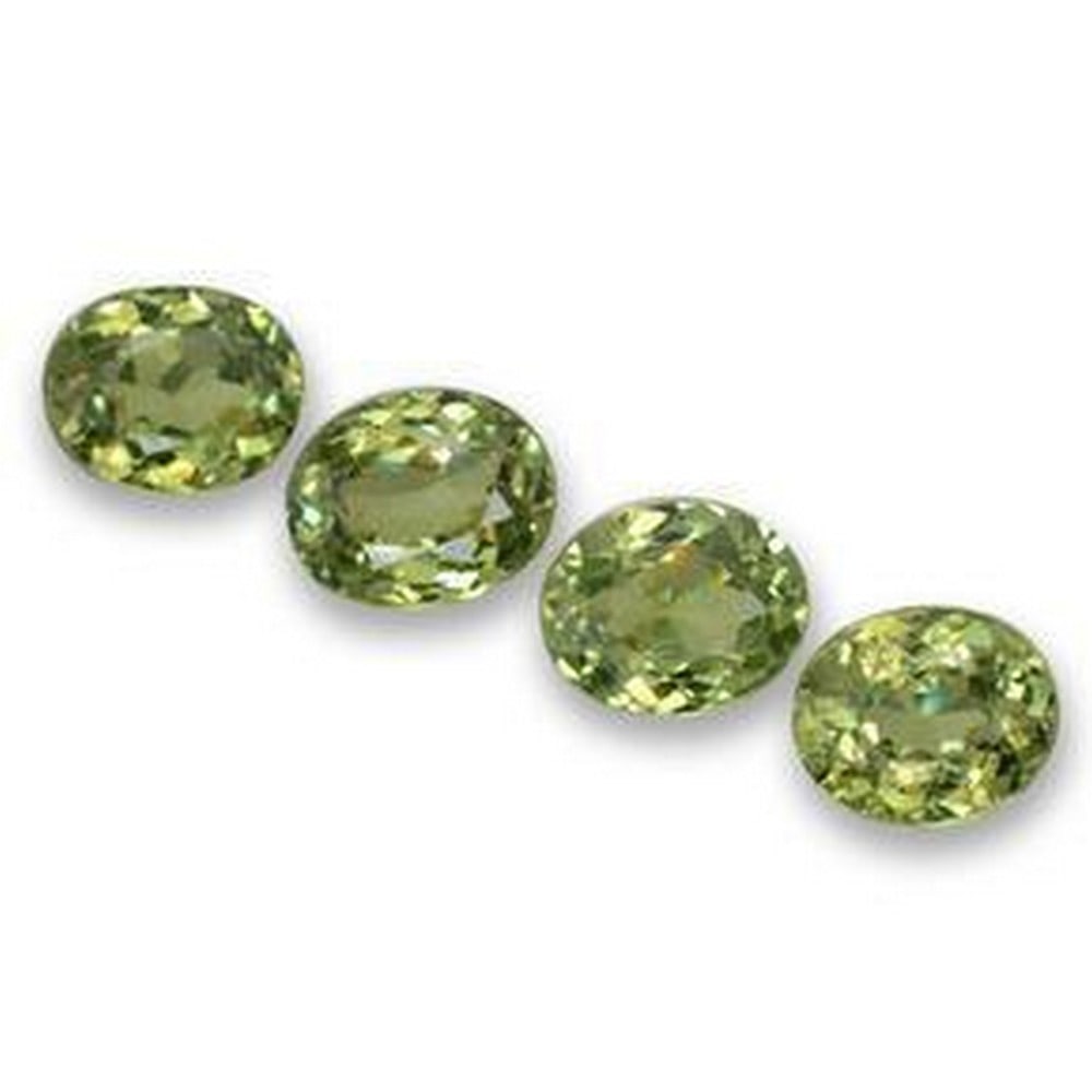 1ct Oval Cut Demantoid Garnets: 1ct Oval Cut Demantoid Garnets This lot contains 4 oval cut Demantoid Garnets, each at 0.42ct Raw Dimension: 5 x 4mm Total Carat Weight: 1.66ct Treated: No Please view photos for furt