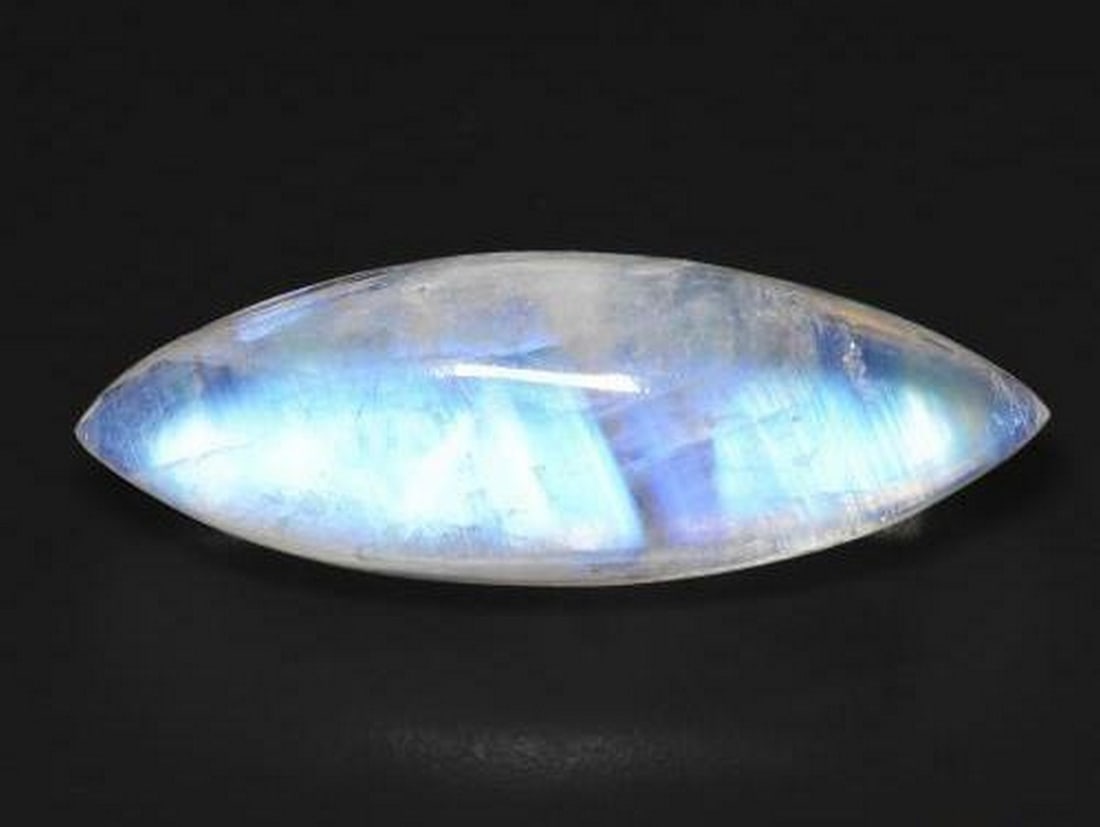 13.2ct Marquise Cut Cabochon Moonlit Bluish White Rainbow Moonstone: 13.2ct Marquise Cut Cabochon Moonlit Bluish White Rainbow Moonstone Behold the enchanting allure of our 13.2ct Marquise Cut Cabochon Moonlit Bluish White Rainbow Moonstone – a celestial