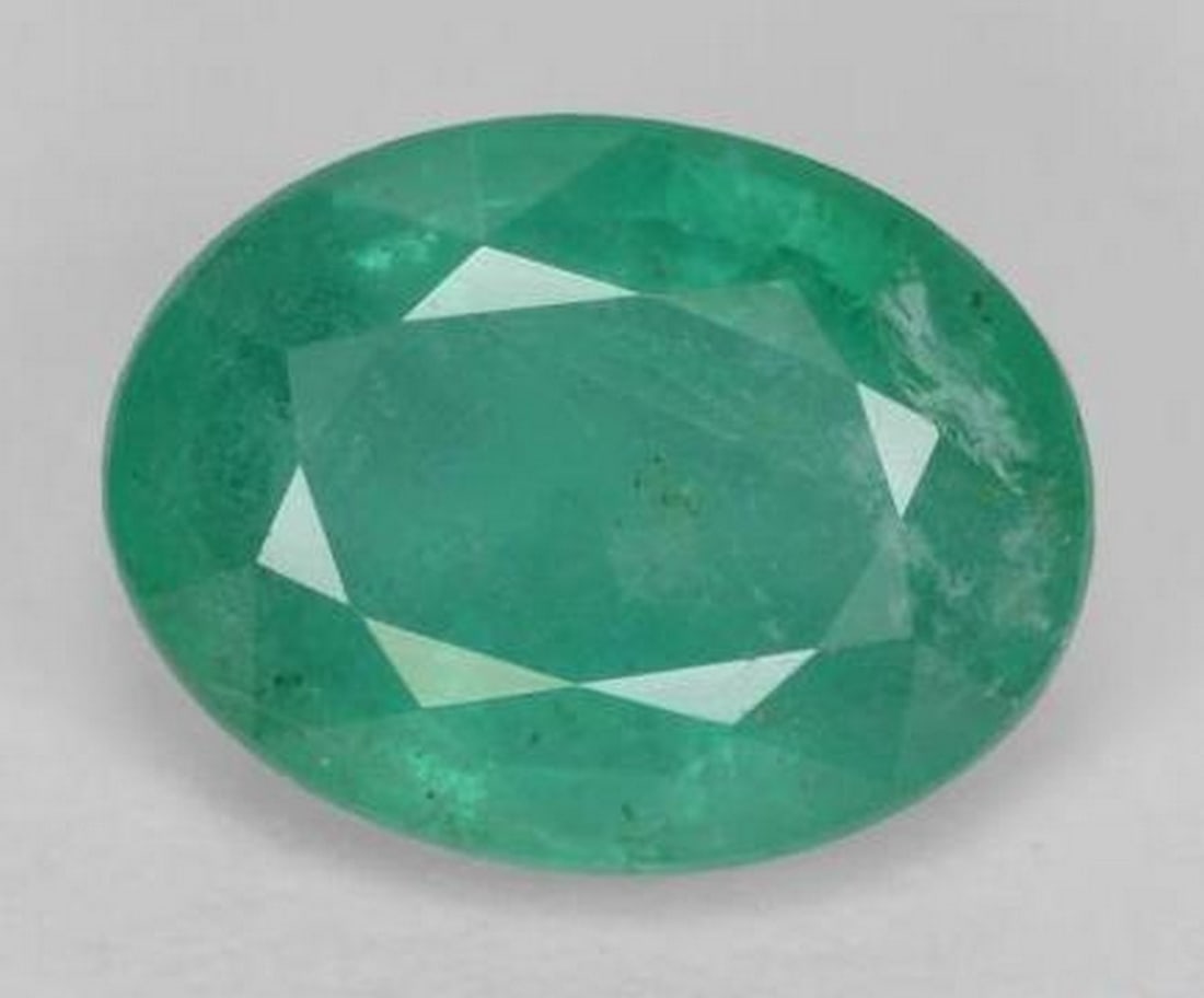 1.16 ct Oval Cut Faceted Sage Bluish Green Emerald Gemstone: 1.16 ct Oval Cut Faceted Sage Bluish Green Emerald Gemstone Introducing our Oval Cut Faceted Sage Bluish Green Emerald Gemstone—a captivating union of sophistication and natural allure. Meticulousl