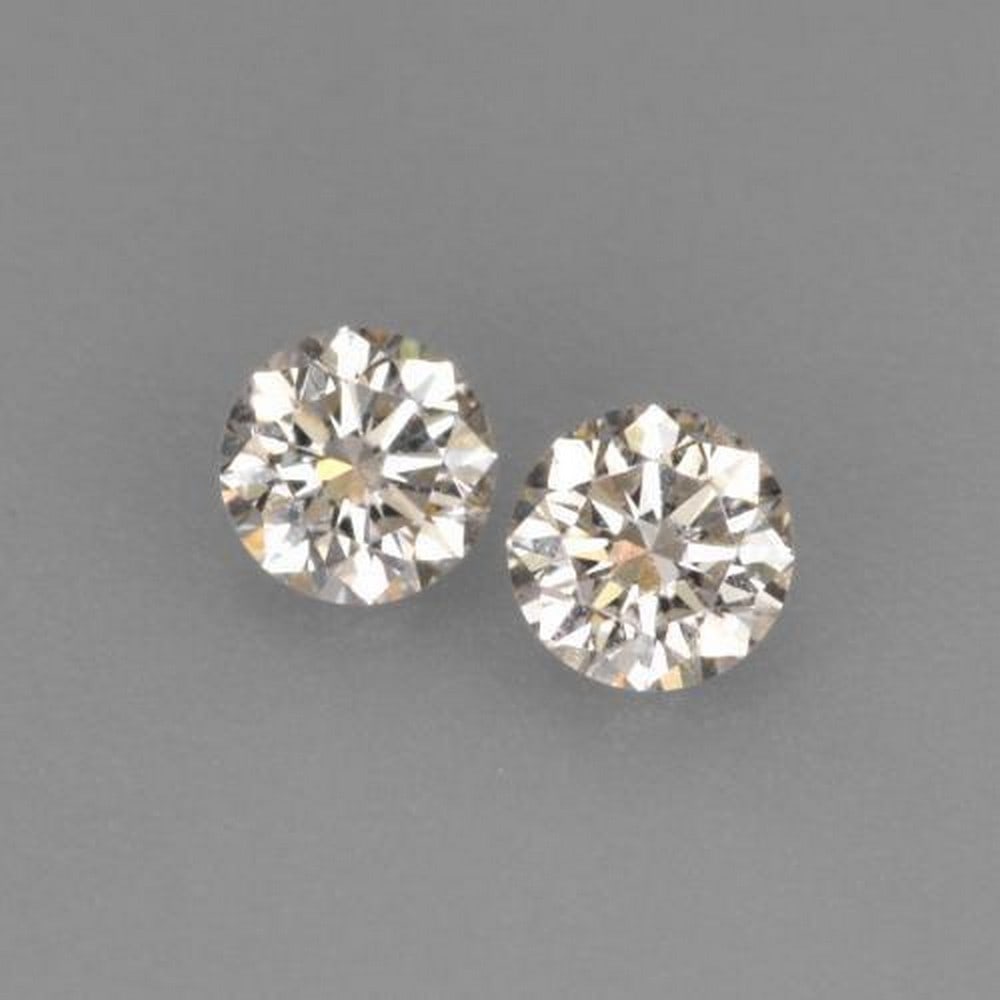 0.15ct Diamond-Cut Warm White Diamonds: 0.15ct Diamond-Cut Warm White Diamonds This lot contains a pair of diamond-cut Diamonds, each at 0.08ct Raw Dimension: 2.8 x 2.8mm Total Carat Weight: 0.15ct Treated: No Please view