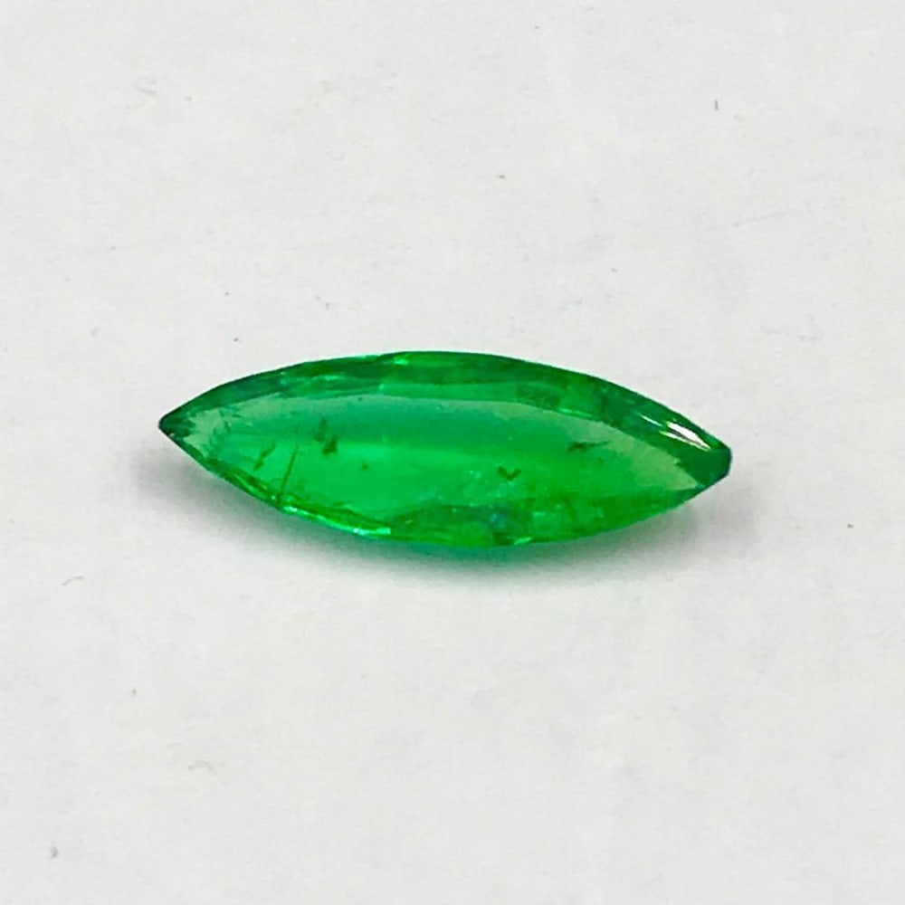 1.48ct Faceted Emerald Marquise Gemstones: Faceted Emerald Marquise For many, emerald is considered to be the symbol of rebirth. It is also believed to represent good fortune, youth, balance, growth, peace, and foresight Size- 15.0x5.2 mm, Wei