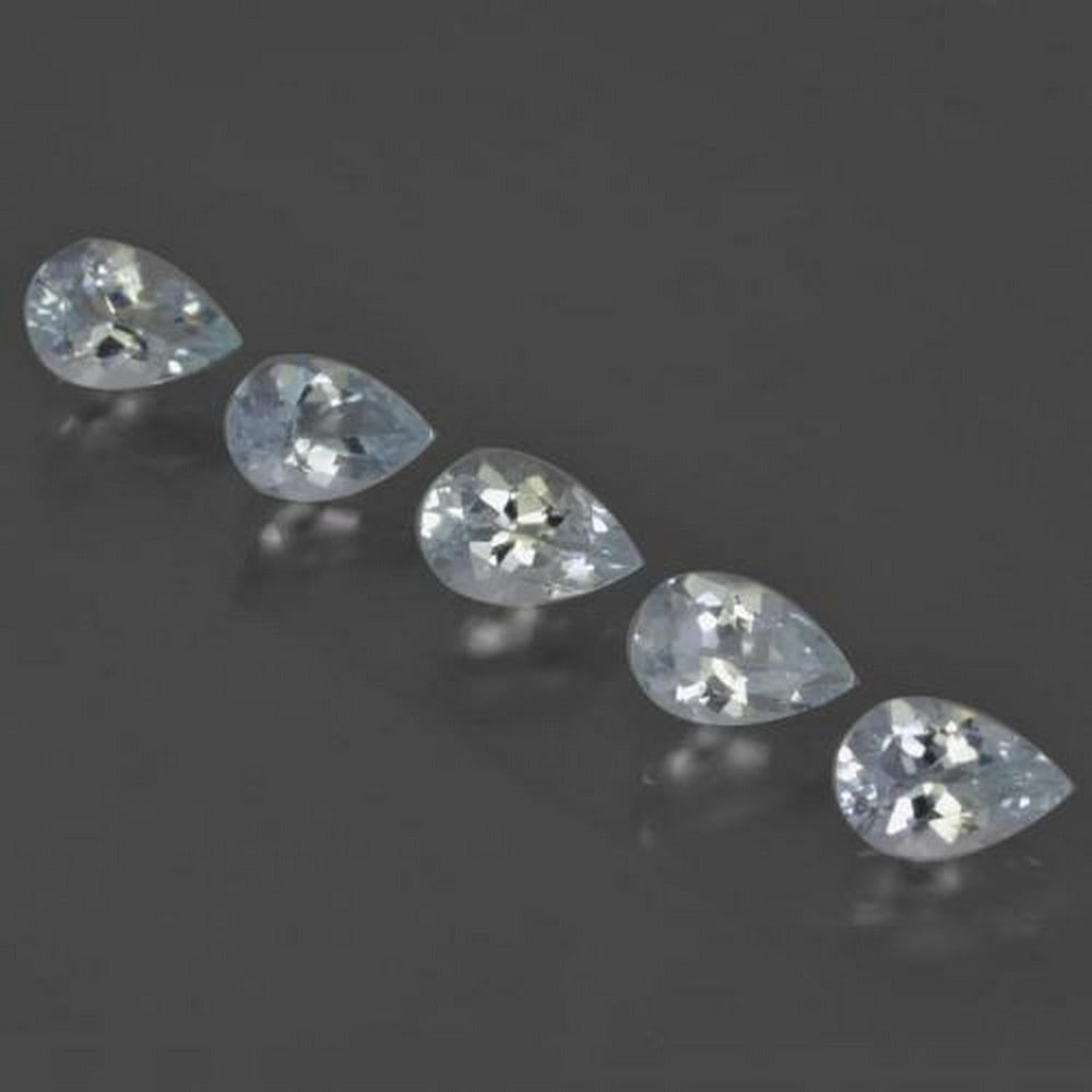 1.8ct Pear Cut Aquamarines: 1.8ct Pear Cut Aquamarine This lot contains 5 pear cut Aquamarines, each at 0.38ct Raw Dimension: 6 x 4mm Total Carat Weight: 1.88ct Treated: No Please view photos for further deta