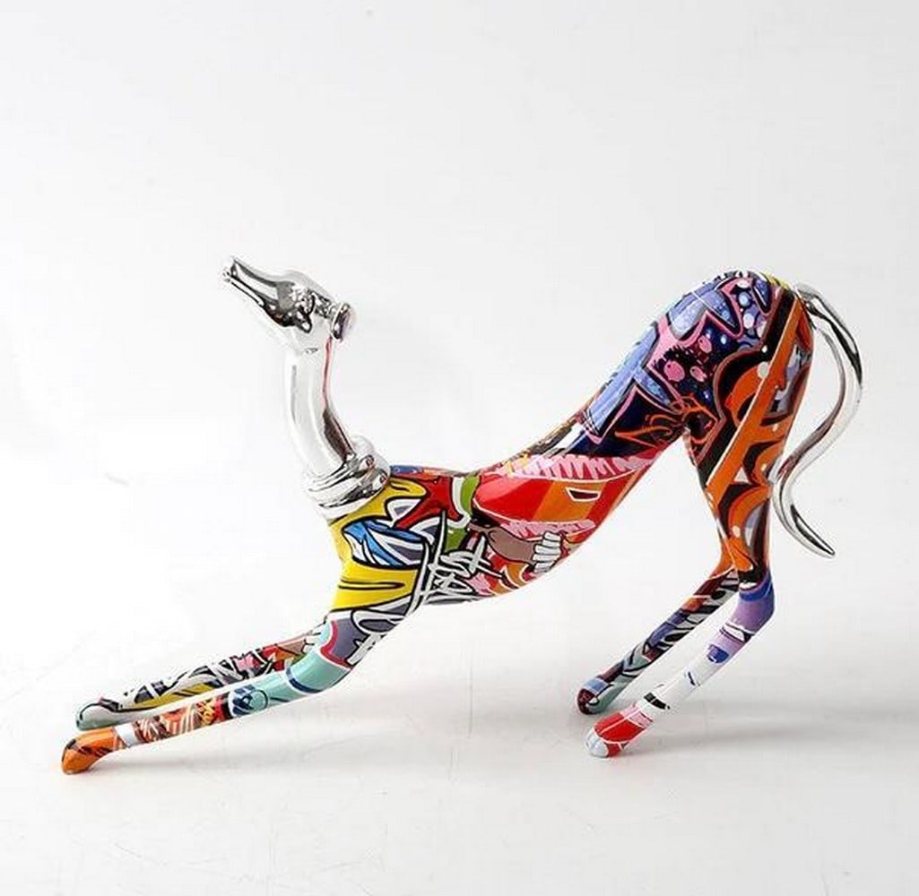 10" - Custom Greyhound Graffiti Painted Statue: 10" - Custom Greyhound Graffiti Painted Statue This is for all the parents who love their fur babies. This cute, unique and colorful Graffiti painted Greyhound Statue will put a smile on your
