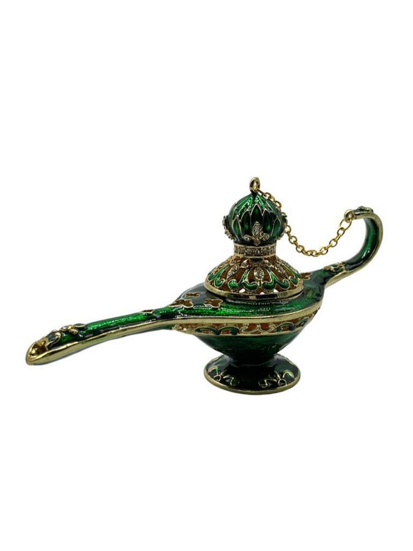 Green Genie Lamp Trinket Box: Green Genie Lamp Trinket Box A captivating piece with a lustrous green finish, adorned with sparkling jewels. It's perfect for storing treasures or as a decorative accent, adding a touch of magi