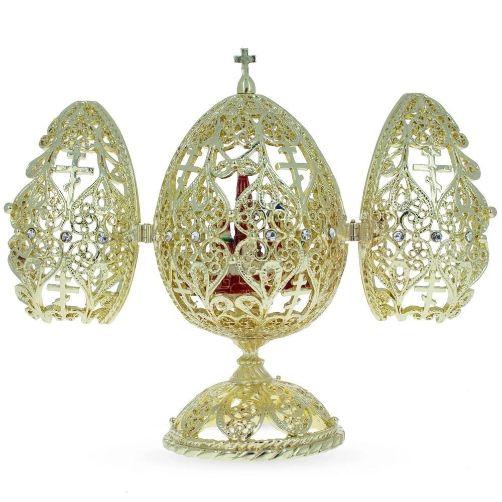 Golden Bejeweled Orthodox Church Easter Egg Figurine: Golden Bejeweled Orthodox Church Easter Egg Figurine This hand-painted, 14K gold-plated pewter egg is adorned with clear Austrian crystals and polished enamel with golden trim. The egg is openable, a