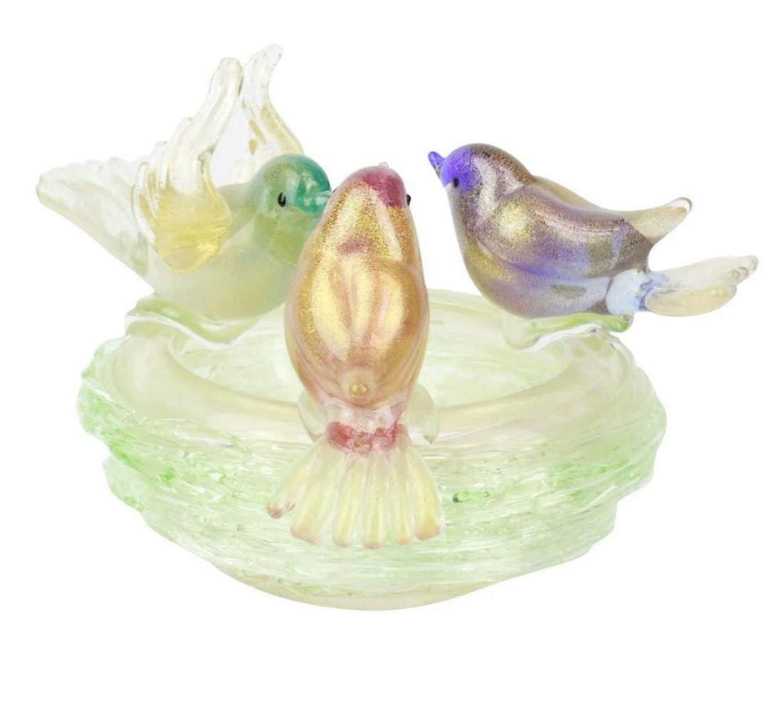 Serene Sparrow’s Nest Murano Glass Vase: Serene Sparrow’s Nest Murano Glass Vase This exquisite Murano glass centerpiece features a nest-shaped design with birds crafted from pure 24kt gold. A stunning addition to any decor, whether as a l
