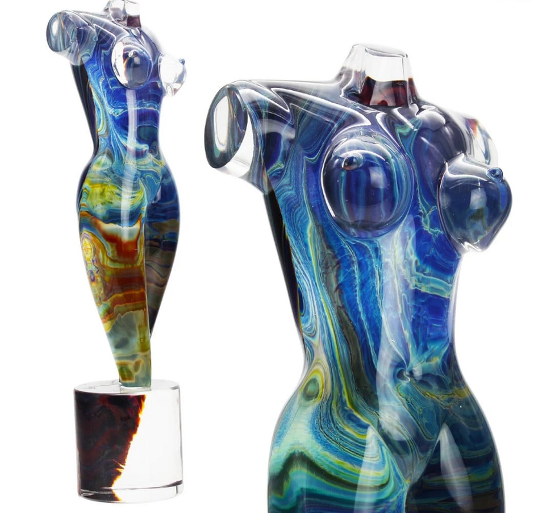 Chalcedony Nude Female Form in Murano Glass: Chalcedony Nude Female Form in Murano Glass The process of crafting with chalcedony glass is notably challenging. It involves blending the conventional glass sphere with silver salts and various color