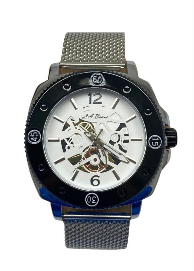 Mens L.A Banus Semi-Skeleton Gloss Finish Chain Link Band Watch: Mens L.A Banus Semi-Skeleton Gloss Finish Shark Mesh Band Watch A brilliant stainless steel and black color glimmers as the watch decorates the wrist. This piece has a black bezel that indicates minu