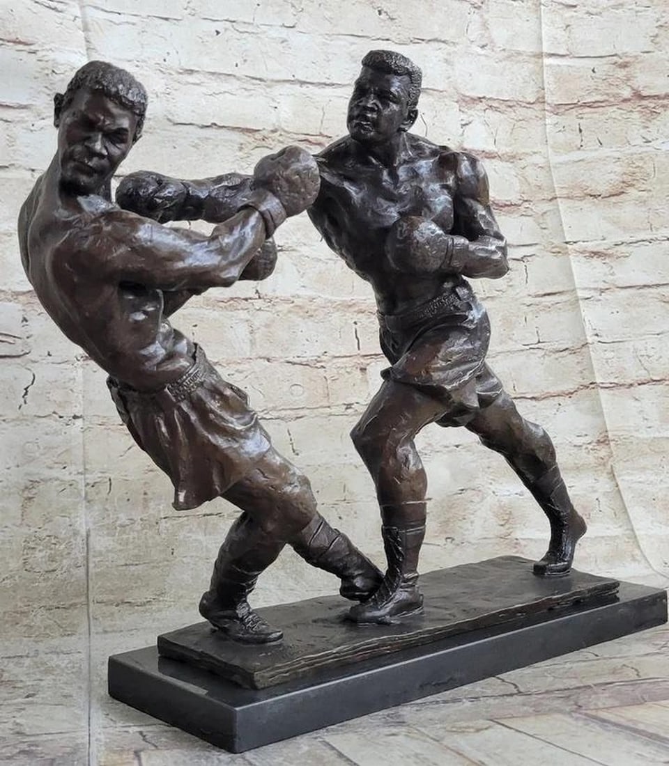 Muhammad Ali & Sonny Liston The Second-Round Fight Battle of the Legends Original Bronze - 12" x 16": Muhammad Ali & Sonny Liston The Second-Round Fight Battle of the Legends Original Bronze - 12" x 16" Introducing "Second Round Fight," a mesmerizing bronze sculpture commemorating