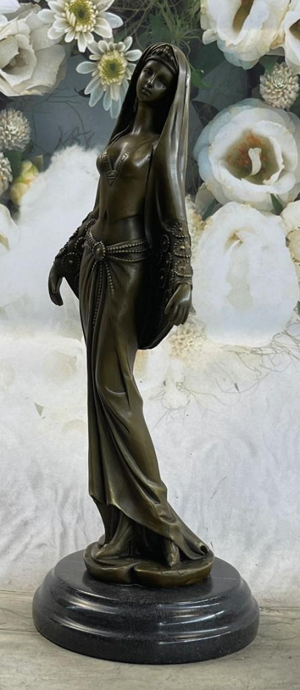 Middle Easter Persian Princess Original Bronze Statue - 13.5" x 5.5": Middle Easter Persian Princess Original Bronze Statue - 13.5" x 5.5" This bronze sculpture captures the elegance of an Arabian woman immersed in the rhythm of music. With graceful poise, she