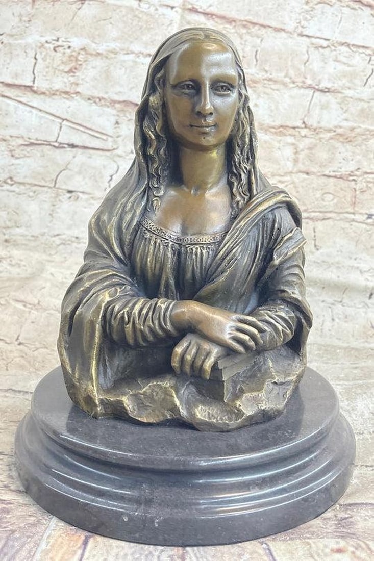 Mona Lisa Bust Bronze Statue: Mona Lisa Bust Bronze Statue Stunning genuine hot cast bronze sculpture mounted on a solid marble base. This bronze measures 10" high and depicts Mona Lisa, inspired by Leonardo da Vinci`s fa