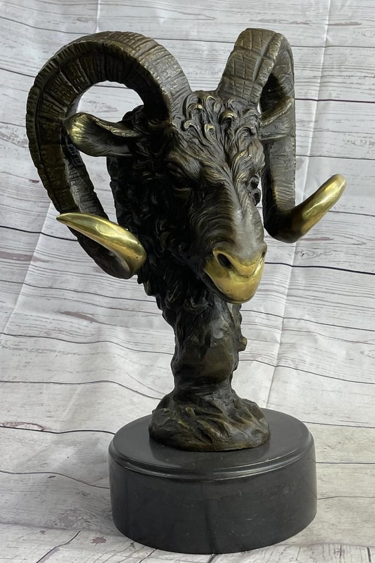 Signed Original Ram Head Bust Bronze Sculpture - 17" x 10": Signed Original Ram Head Bust Bronze Sculpture - 17" x 10" Presenting a remarkable bronze sculpture of a majestic ram, symbolizing strength, cultural significance, and fertility across ancien