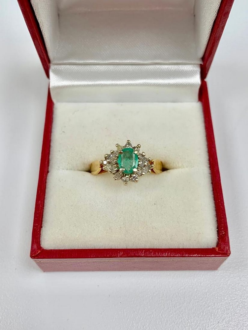 B & G Marked - One of a Kind Ladies Size 7 14k Gold, Emerald and Diamond Ring: This amazing ring consists of a oval cut Emerald main stone, and is surrounded by twelve round cut diamonds, each precisely placed to bring out the Emeralds wondrous color. Please view photos for furt