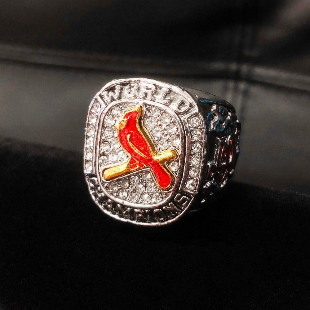 2011 St. Louis Cardinals - MLB Championship Ring: 2011 St. Louis Cardinals - MLB Championship Ring. A Red Enameled Perching Cardinal Faces The Stone Crusted Silver Colored Ring. One Of The Nicest Designs For A Champions Ring. View Photos For Further