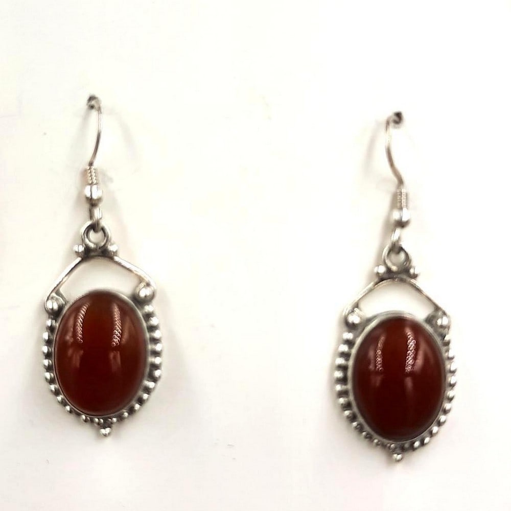 Studded Red Agate Oval Cabochon Earrings: Studded Red Agate Oval Cabochon Earrings Red agate is tied to passion, self love, and perseverance. Agate is liked to bright ideas and positive thinking, symbolizing harmony and rebalance. View Phot
