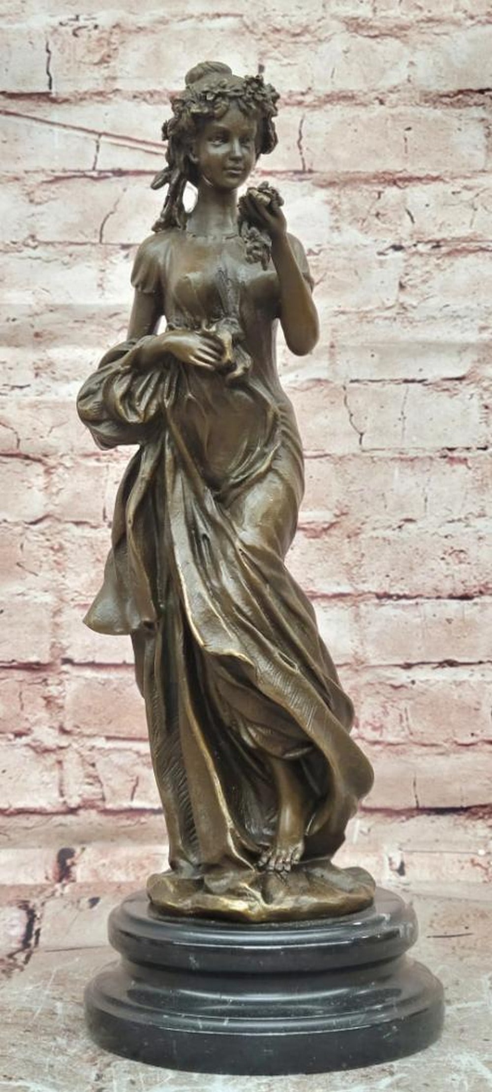 Milo Original Rose Goddess Bronze Sculpture - 14.5" x 5": Milo Original Rose Goddess Bronze Sculpture - 14.5" x 5" This original bronze sculpture depicts a goddess in a serene, elegant pose, gently holding a rose. The figure emphasizes graceful lines