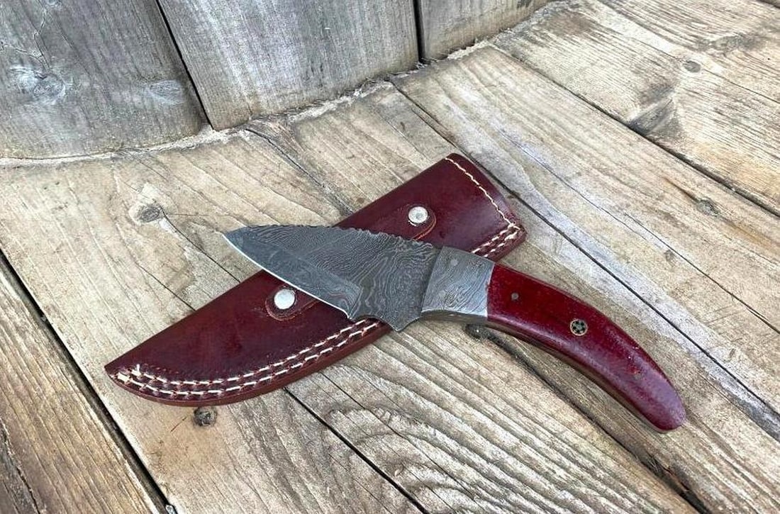 9" Damascus Drop Point Blade With Custom Designed Exotic Handle: 9" Damascus Drop Point Blade With Custom Designed Exotic Handle. Damascus Steel Blade with 256 Layers on it. HARDNESS 56-60 H R C VERY HIGH QUALITY GENUINE LEATHER SHEATH View Photos For Further