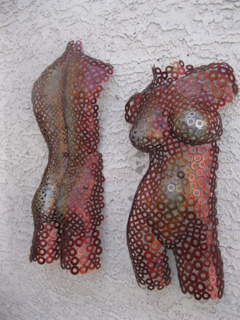 His and Hers XI Metal Sculpture: His and Hers XI Metal Sculpture This captivating two-piece sculpture masterfully combines a half male and half female torso, hand-formed and welded by the artist. His and Hers XI transcends the
