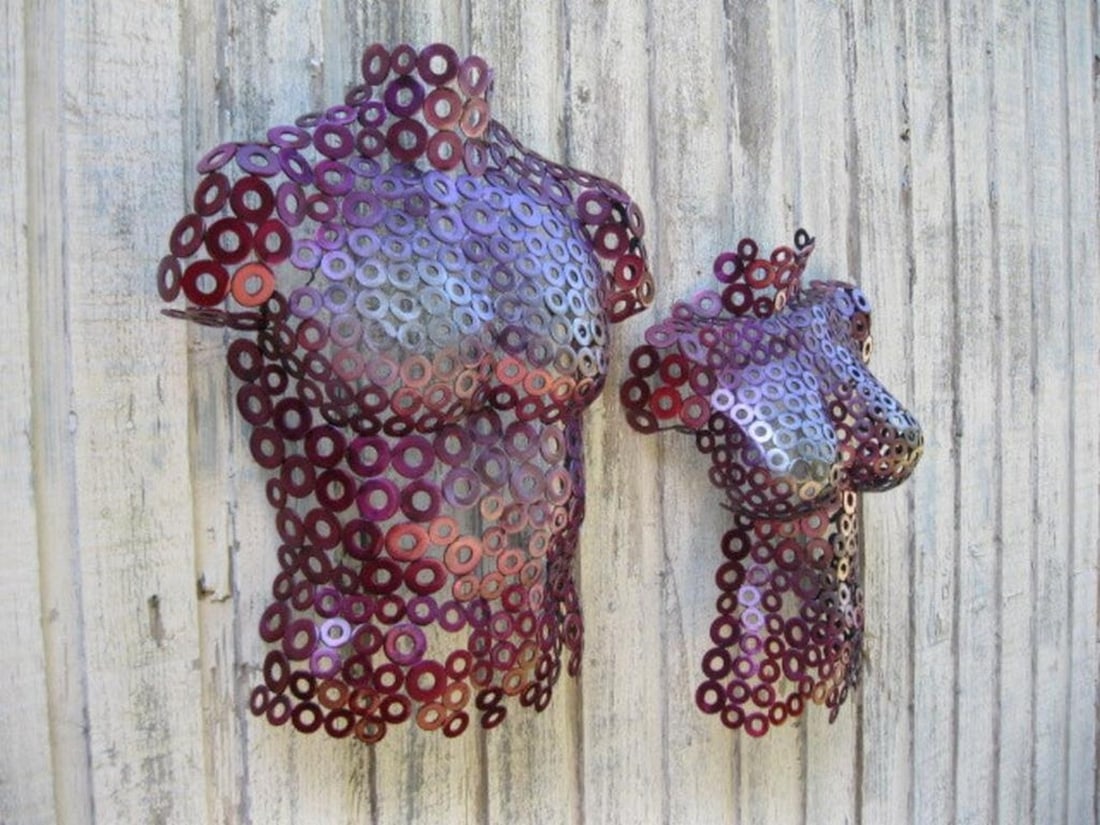 Together Metal Sculpture: Together Metal Sculpture This captivating two-piece female torso sculpture is a striking example of modern metal art, hand-formed and welded with precision. Created by the artist, each piece is