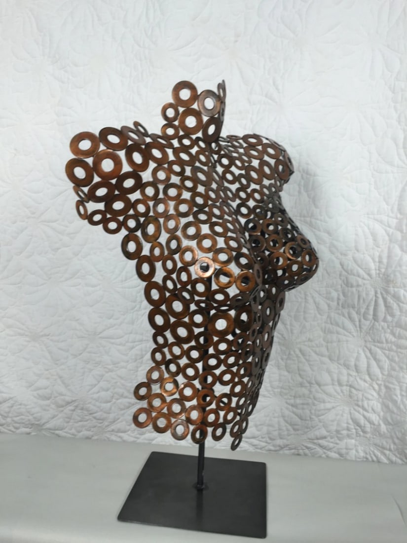 Abstract Metal Female Torso Sculpture: Abstract Metal Female Torso Sculpture Elevate your space with this striking limited-edition metal sculpture. This free-standing female torso is meticulously formed and welded, blending metalwork with