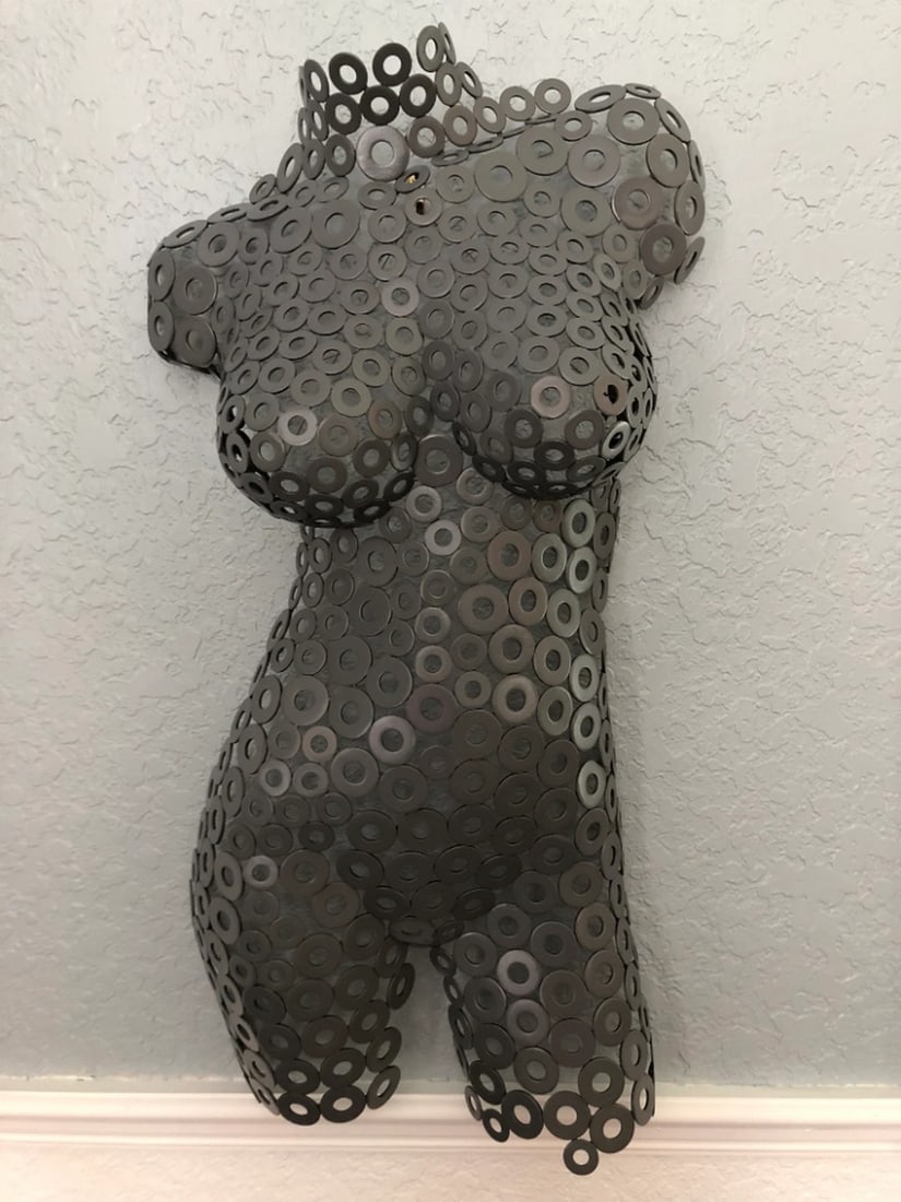 Matte Black Metal Female Torso Sculpture: Timeless Gray Torso Sculpture This captivating female torso sculpture showcases a harmonious blend of form and texture, expertly hand-formed and welded to perfection. The fine details, created through