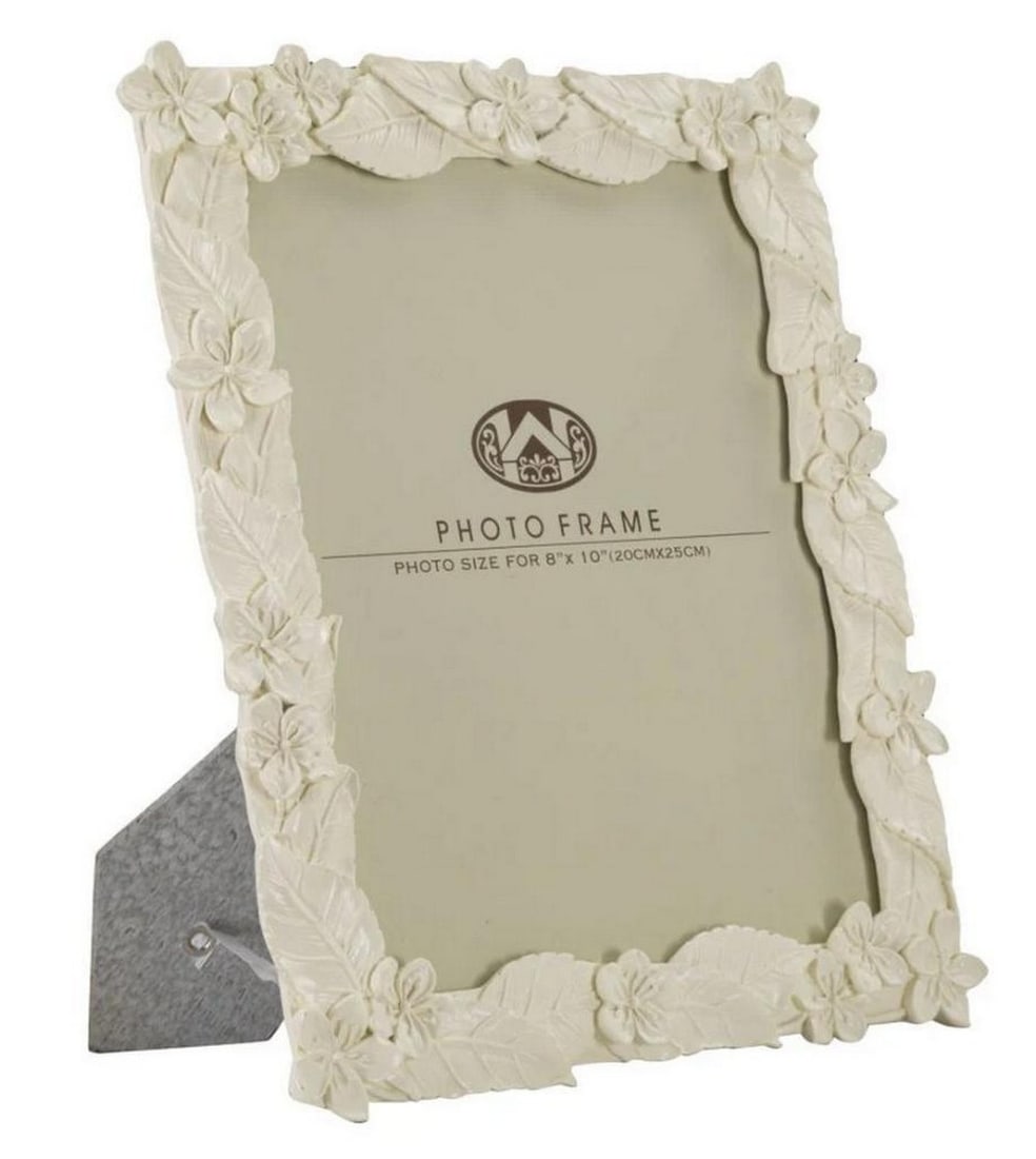 White Floral and Leaf Photo Frame: White Floral and Leaf Photo Frame Elegant photo frame adorned with leaves and flowers, suitable for 20x25 cm photos. Discover Mauro Ferretti, the epitome of Italian excellence for home