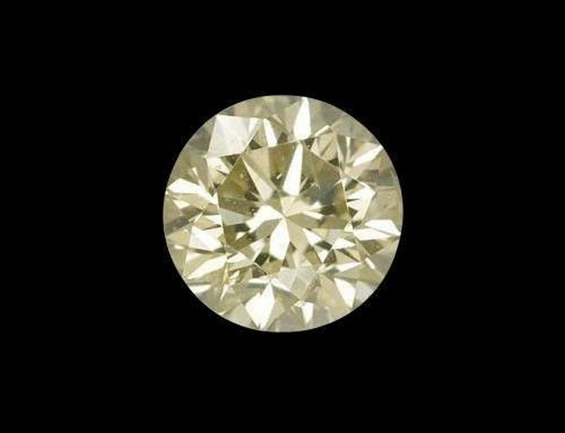 0.19 ct Round Natural L Color Diamond: 0.19 ct Round Natural L Color Diamond This natural 0.19-carat diamond from India is precision cut in a classic round diamond cut, displaying an L color grade with bright, understated warmth. With