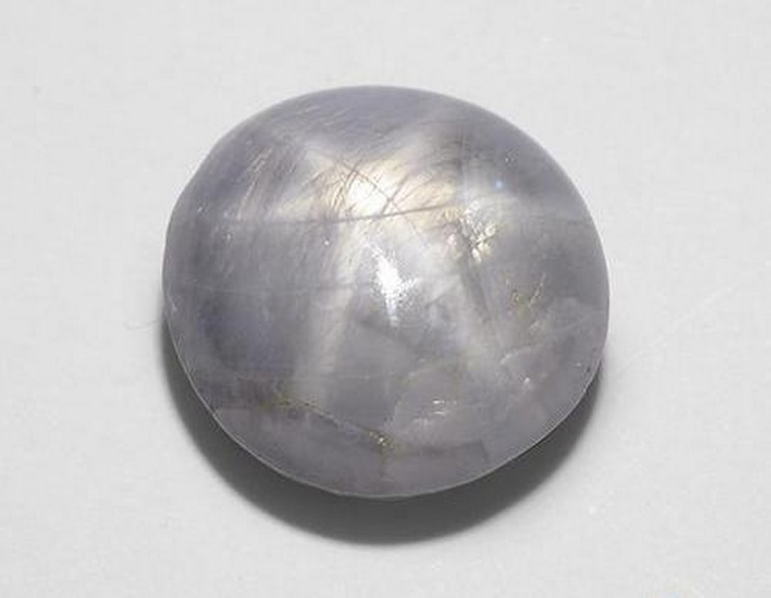 7.88ct Oval Cut Light Grey Star Sapphire Cabochon (1 of 2)