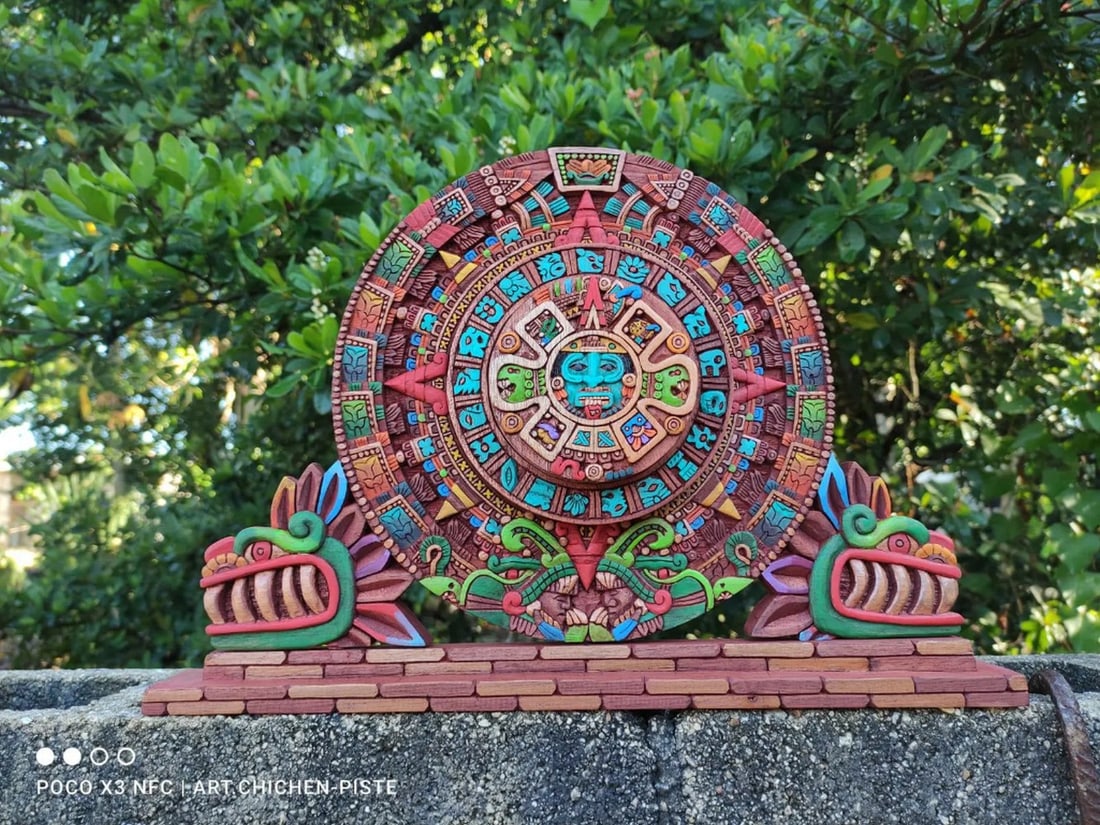 Hand Carved Aztec Calendar Sculpture: Hand Carved Aztec Calendar Sculpture This exquisite handcrafted artwork was created with care and inspiration by a Mayan artist from Yucatán, Mexico. Like the Mayan calendar, the Aztec calendar com