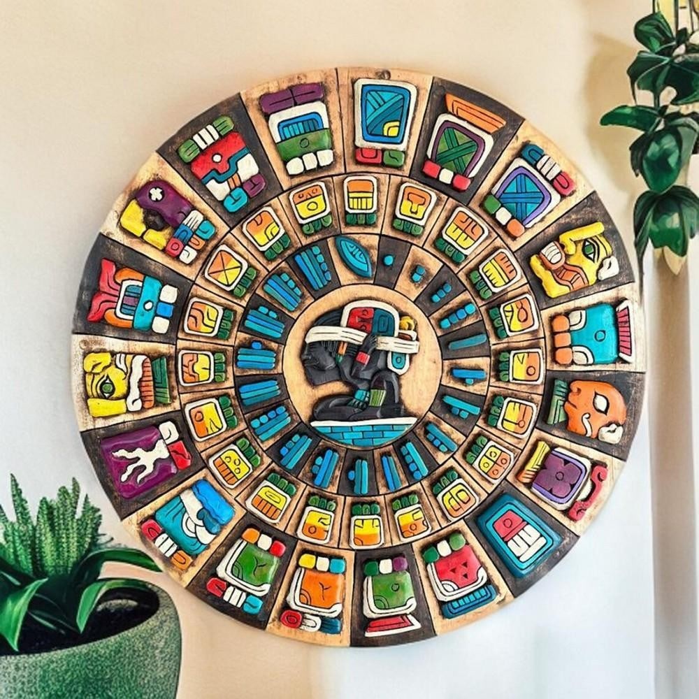 Handcrafted Mayan Calendar Wall Art: Handcrafted Mayan Calendar Wall Art This stunning 3D wooden Mayan calendar is hand-carved and painted in rich rustic tones, bringing ancient Mesoamerican heritage to life. Featuring intricate glyphs a