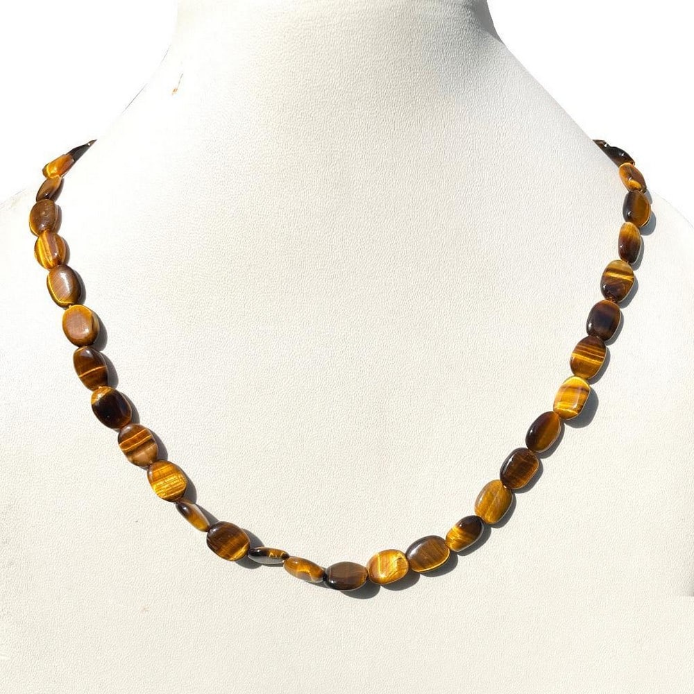 Tiger's Eye Gemstone Necklace: Tiger's Eye Gemstone Necklace Length of Necklace: 45cm View Photos For Further Details