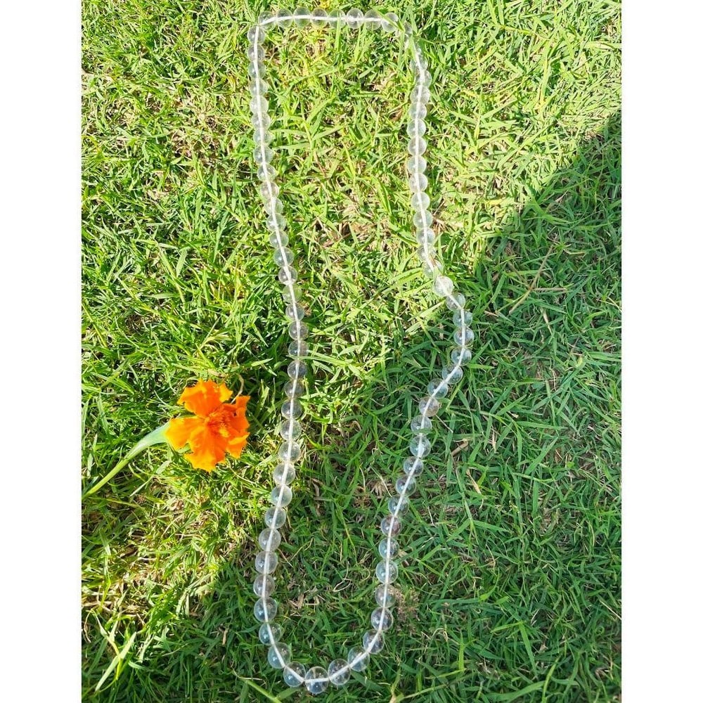 30" Circular Crystal Round Bead String Necklace: 30" Circular Crystal Round Bead String Necklace Introducing our 30" Circular Crystal Round Bead String Necklace, a captivating accessory that effortlessly blends modern chic with timeless