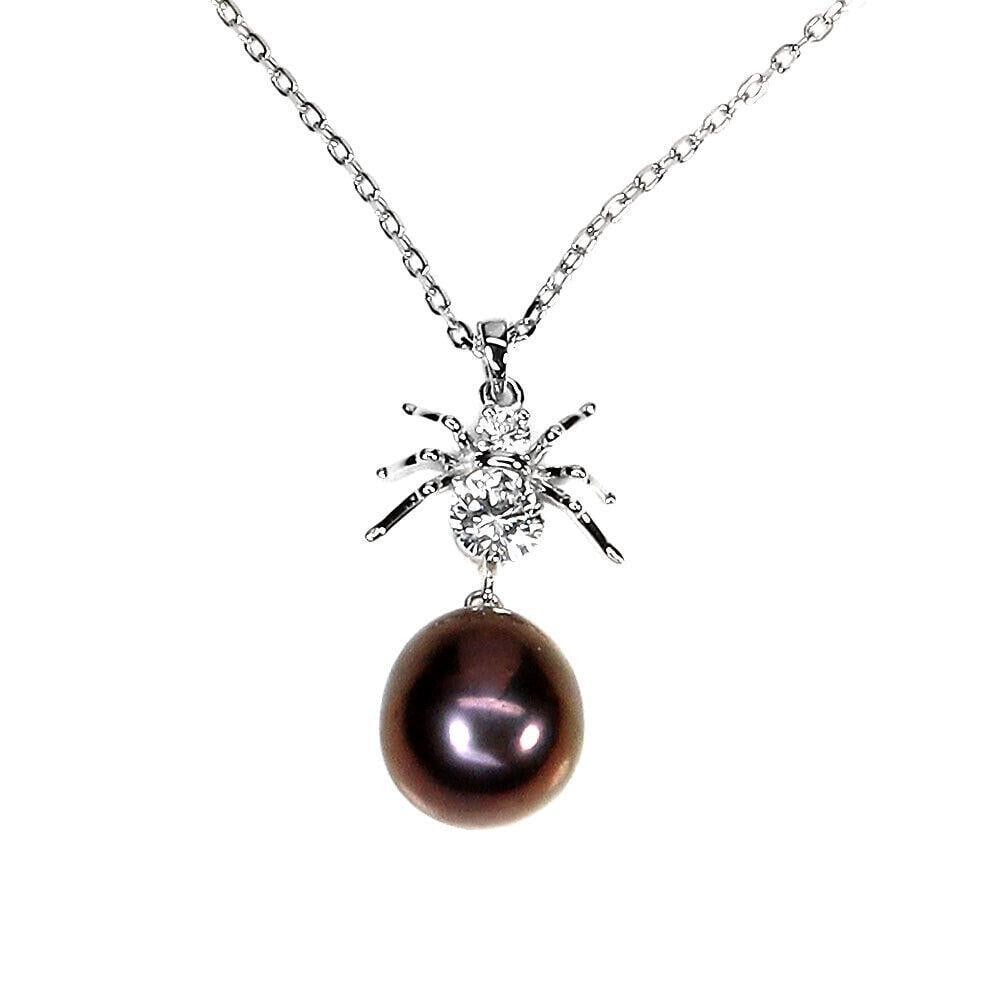925 Sterling Silver Baroque Pearl & CZ Gemstone Necklace: 925 Sterling Silver Baroque Pearl & CZ Gemstone Necklace Metal: 925 Sterling Silver Plate: 14k White Gold Main Stone: Pearl Main Stone Treatment: Cultured Freshwater Secondary Stone: