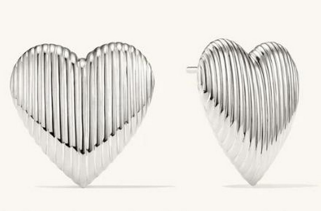 Sterling Silver Heart Stud Earrings: 925 Sterling Silver Heart Stud Earrings. Delicate and charming, these sterling silver heart stud earrings add a touch of love to any look. Featuring a sleek, polished finish, they offer a timeless