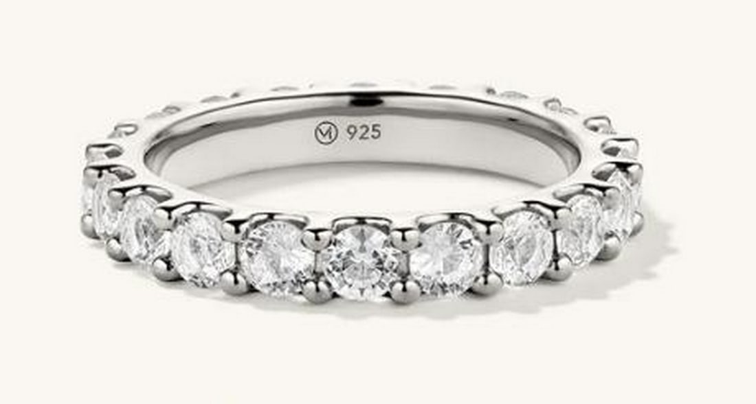 Lab-Grown White Sapphire & 925 Sterling Silver Statement Ring: Lab-Grown White Sapphire & 925 Sterling Silver Statement Ring. Set in sleek sterling silver, this exquisite ring features dazzling lab-grown white sapphires, radiating brilliance and