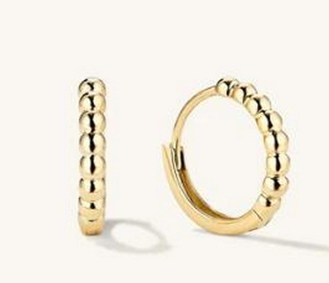 14K Yellow Gold Golden Dew Hoops: 14K Yellow Gold Golden Dew Hoops. Crafted from 14K yellow gold, these stunning hoops feature a beaded design that mimics glistening droplets of gold, adding texture and dimension to a timeless