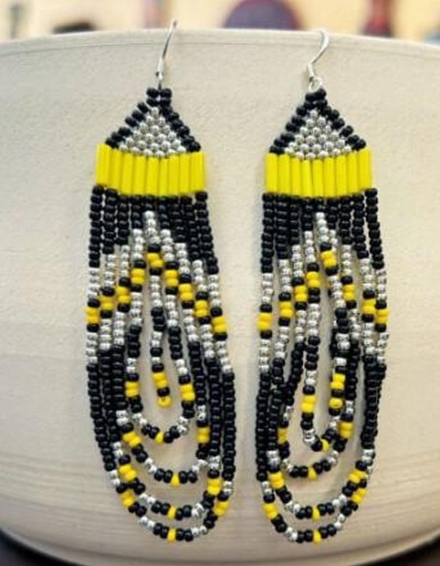 Geo Harmony Earrings: Geo Harmony Earrings The Geo Harmony Earrings showcase the perfect balance between modern design and timeless elegance. Crafted with precision, these beaded earrings feature clean, geometric