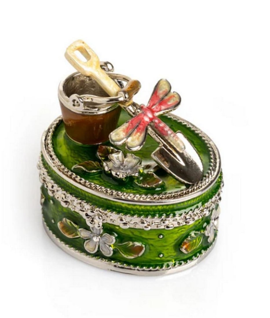 Dragonfly Sand Keepsake???????: Dragonfly Sand Keepsake This charming enamel-painted trinket box, featuring a whimsical bucket and shovel design accented by a delicate pink dragonfly, is a handcrafted treasure adorned with handpicke
