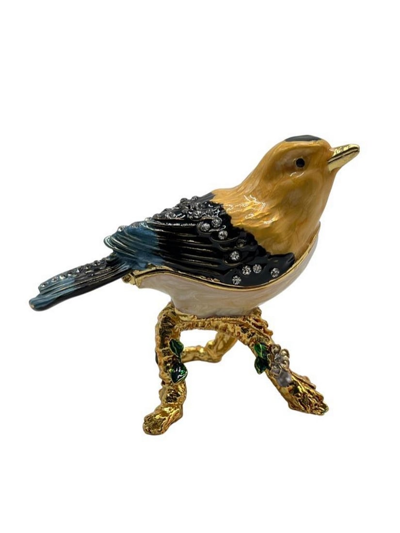 Yellow Bird Perched On Tree Trinket Box: Yellow Bird Perched On Tree Trinket Box A charming and whimsical piece that captures the beauty of nature in a sparkling form. Crafted from high-quality metal, this trinket box features a delightful
